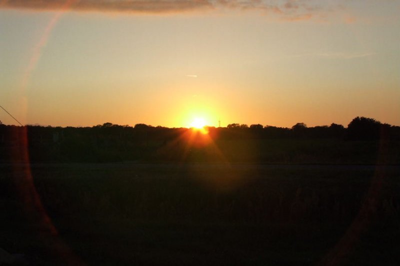 tochnadebuienookeenmooiezonsondergangopvrijdag.jpg